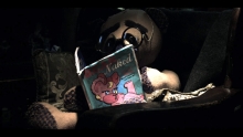 Teddy Bear reading teddy bear porn.  Screen capture for the short film "Grow the Fuck Up!"